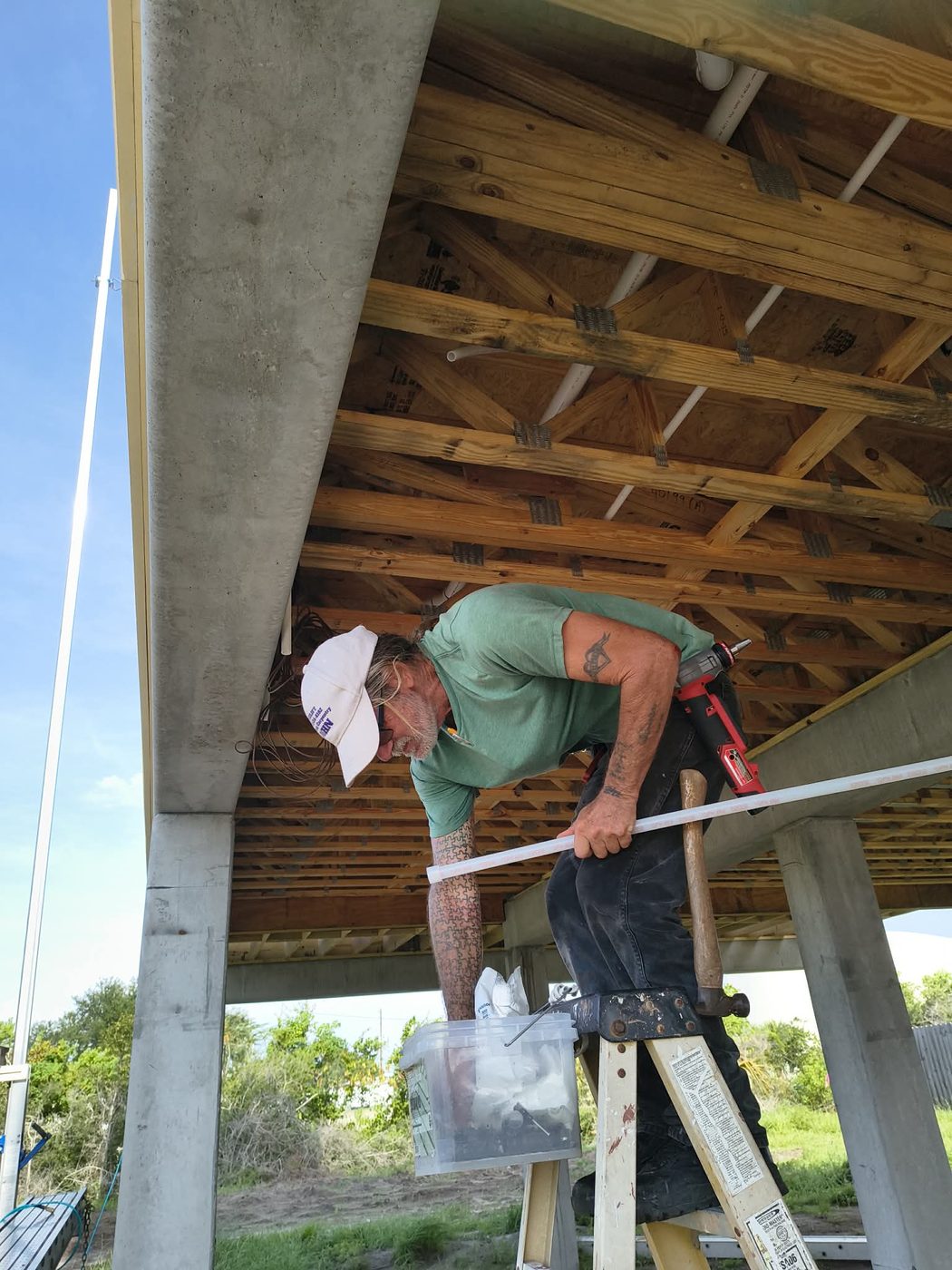Face Lift LLC plumber on the job at a new construction site